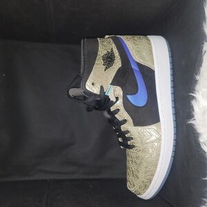 #65 Nike High-Top Sneakers with Blue and Gold Accents